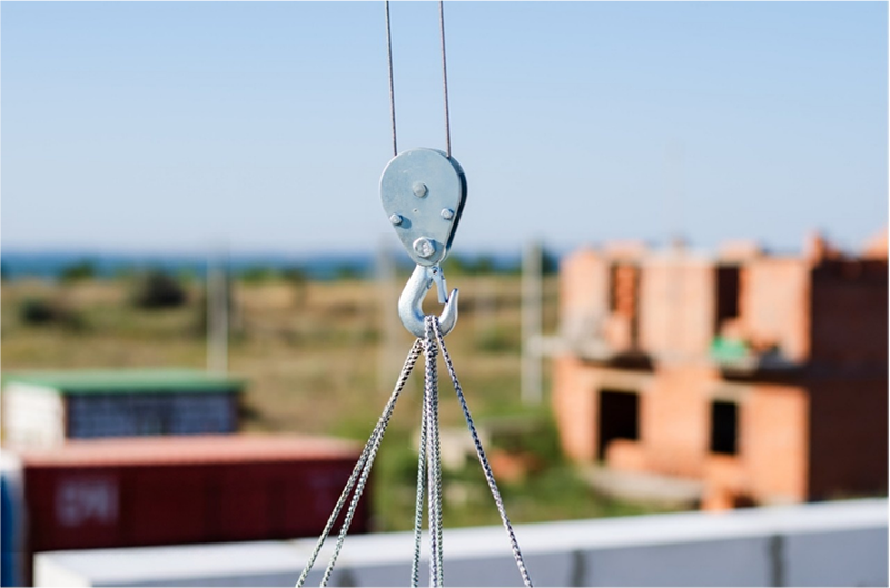 electric winch hook lifts load on cables